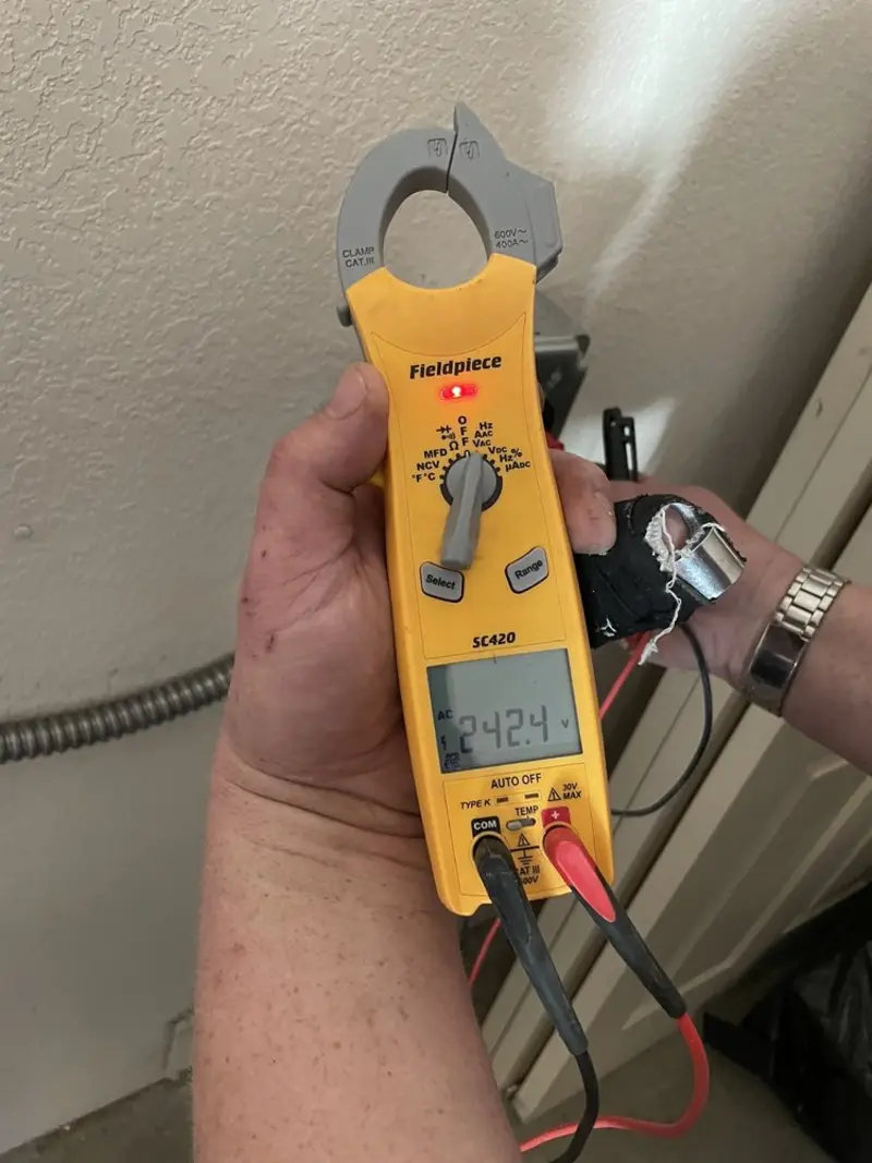 Voltage testing with clamp meter during Circuit Breaker Repair in Bridgeville